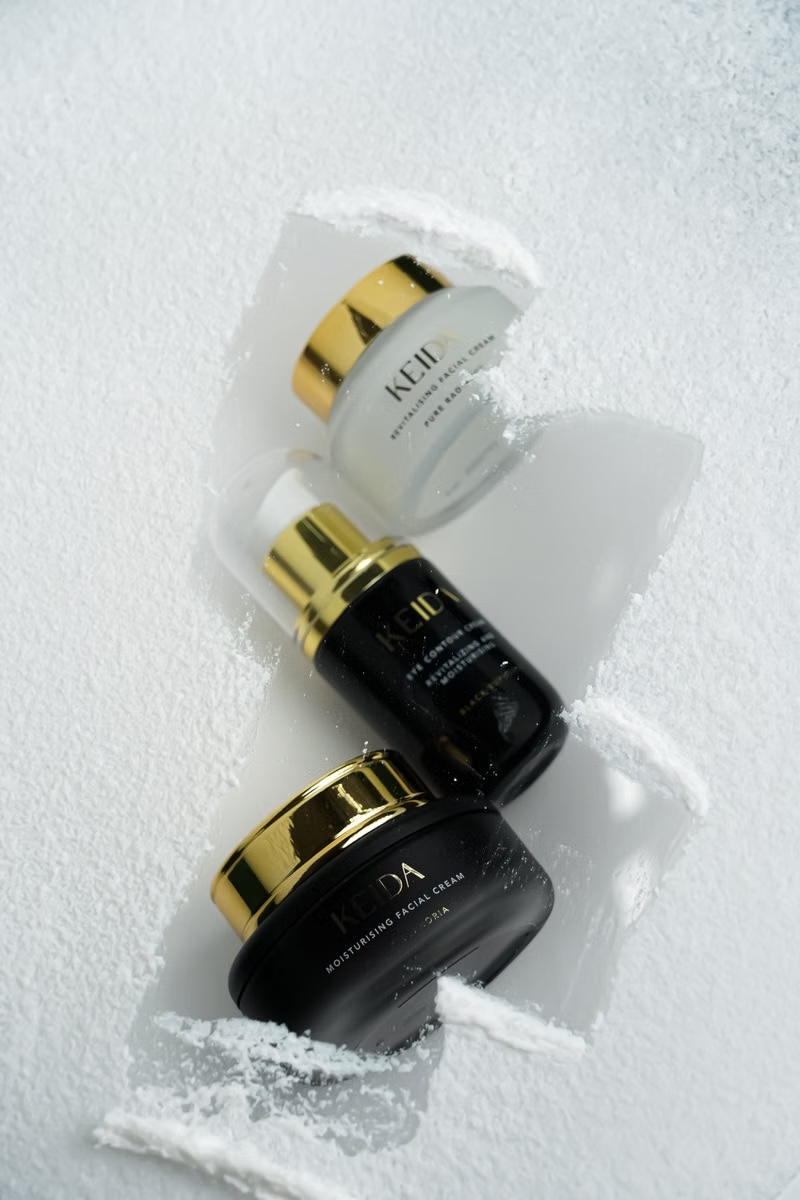Skincare product arranged on a bright white background