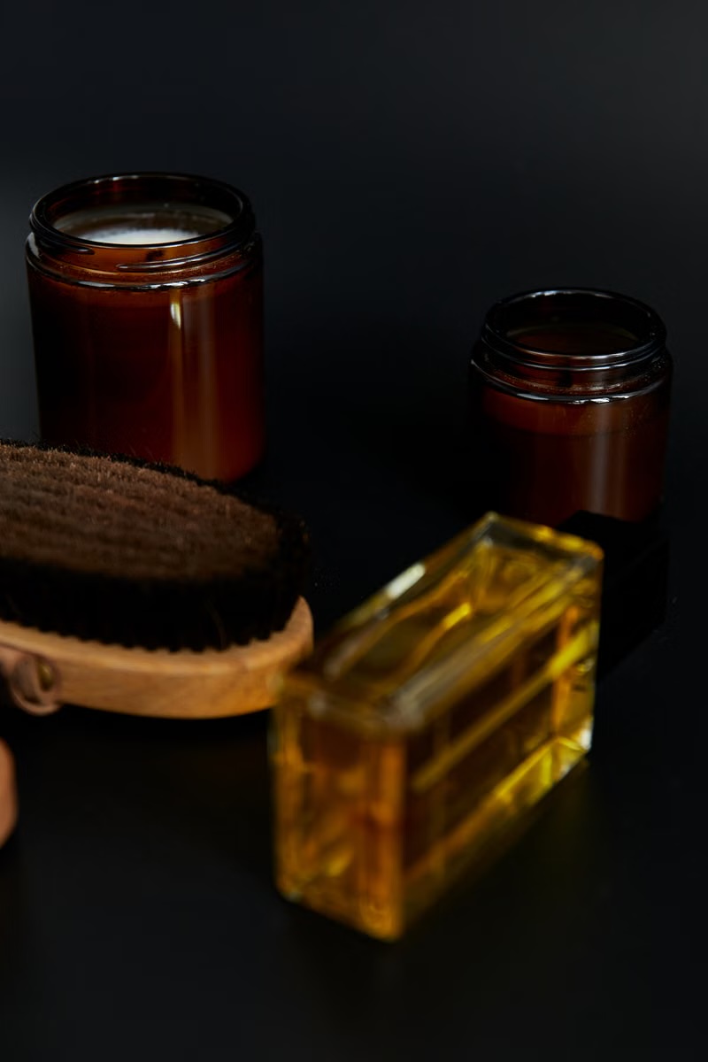 Atmospheric candle and bath spa setting with warm tones