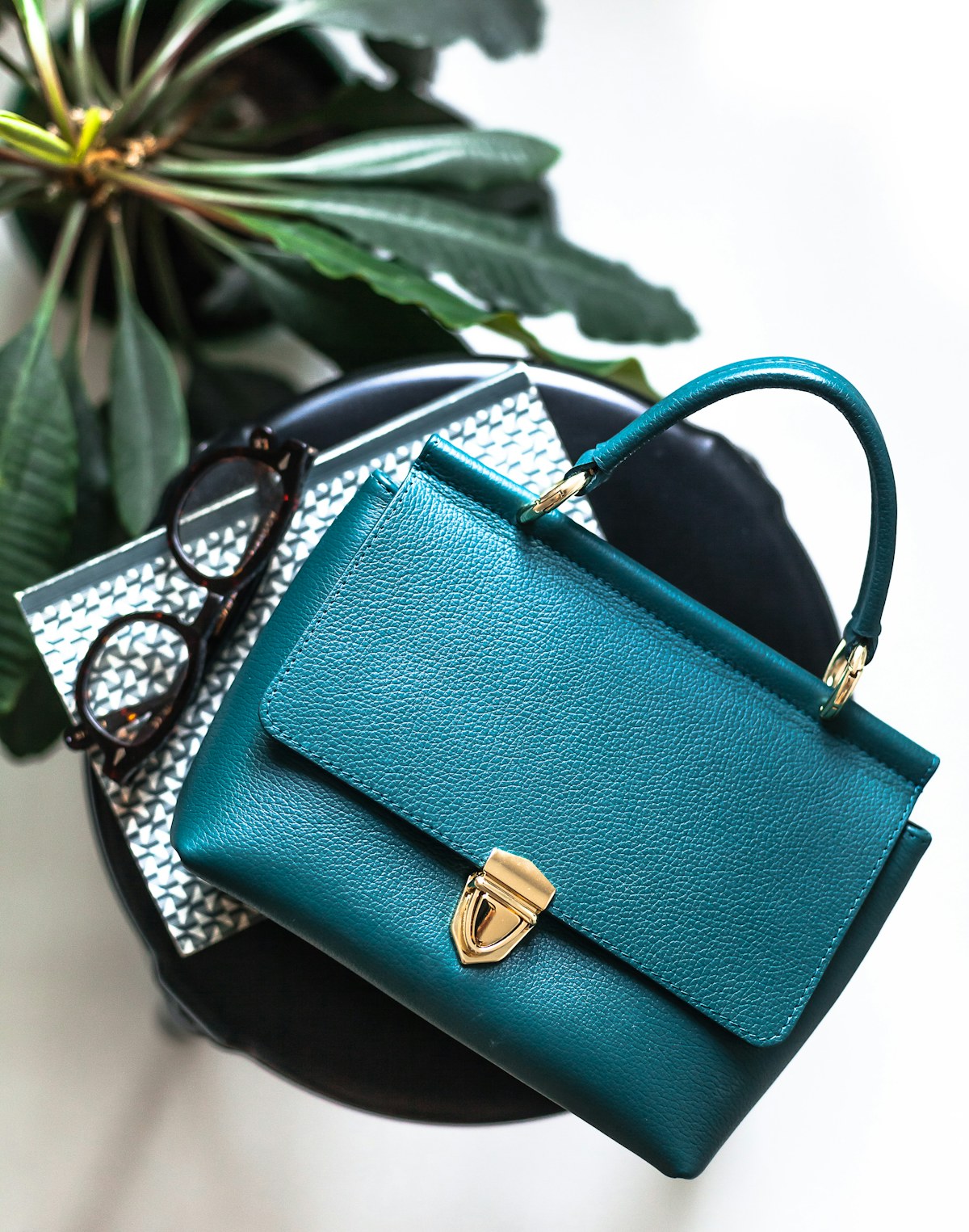 Luxury leather handbag tabletop photo
